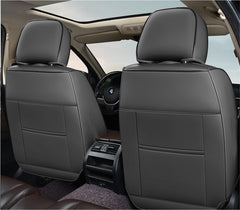 Huse auto premium 5 locuri Carguard Deluxe piele ecologică perforată și textil - negru - alb Carguard - imagine 4